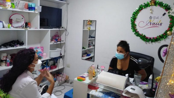 A refugee who started a nail salon ©PLAN